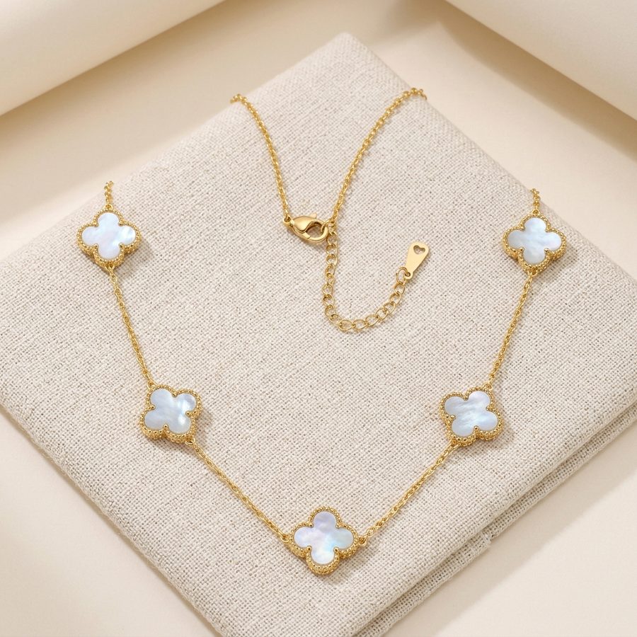 White clover necklace on linen