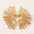 Gold sunburst fan earrings, front view