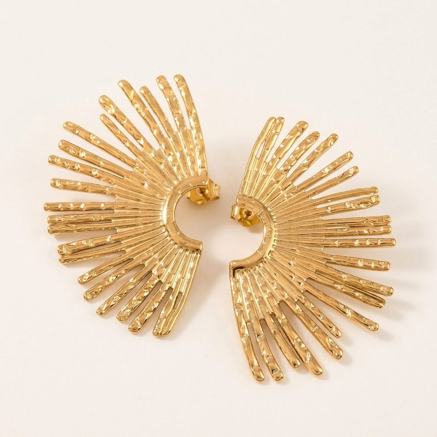Gold sunburst fan earrings, angled view