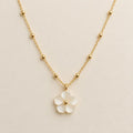 Mother of pearl flower pendant necklace on gold beaded chain