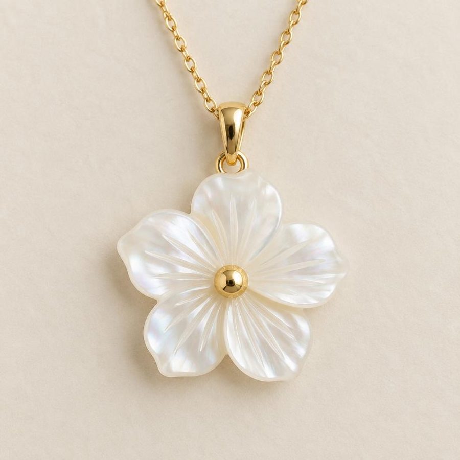 Close-up of the carved mother of pearl flower pendant