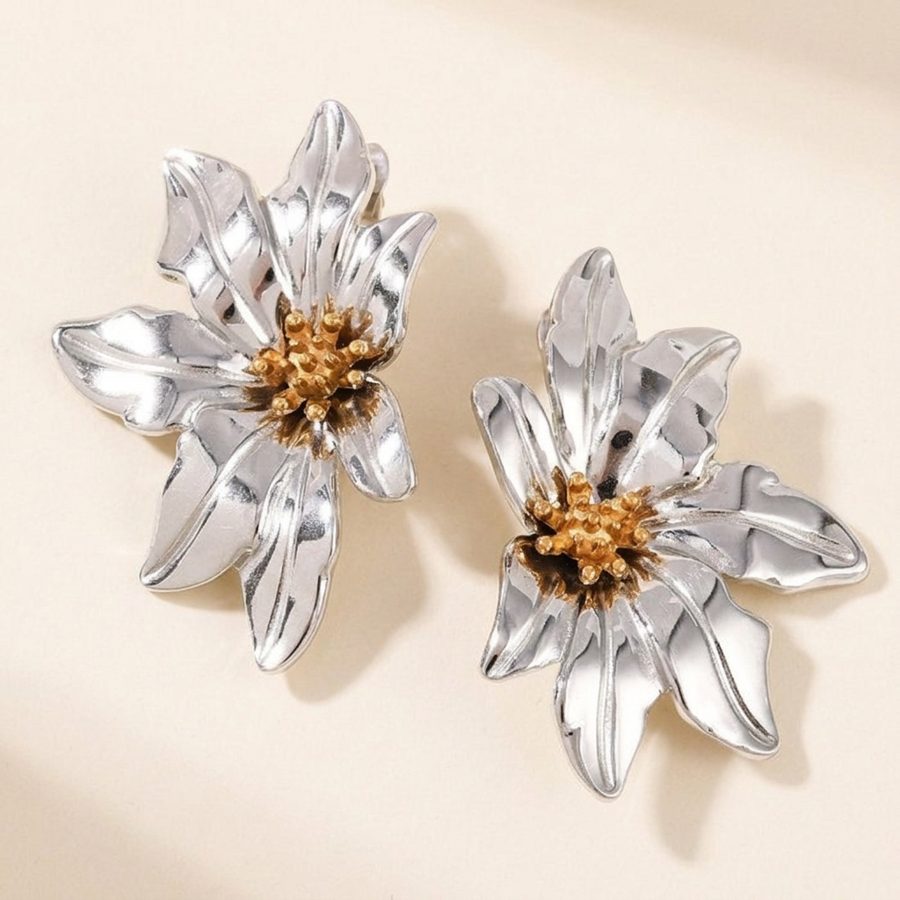 Two-tone flower stud earrings, angled view