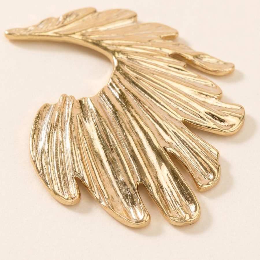 Golden Wing earring, wing texture close-up