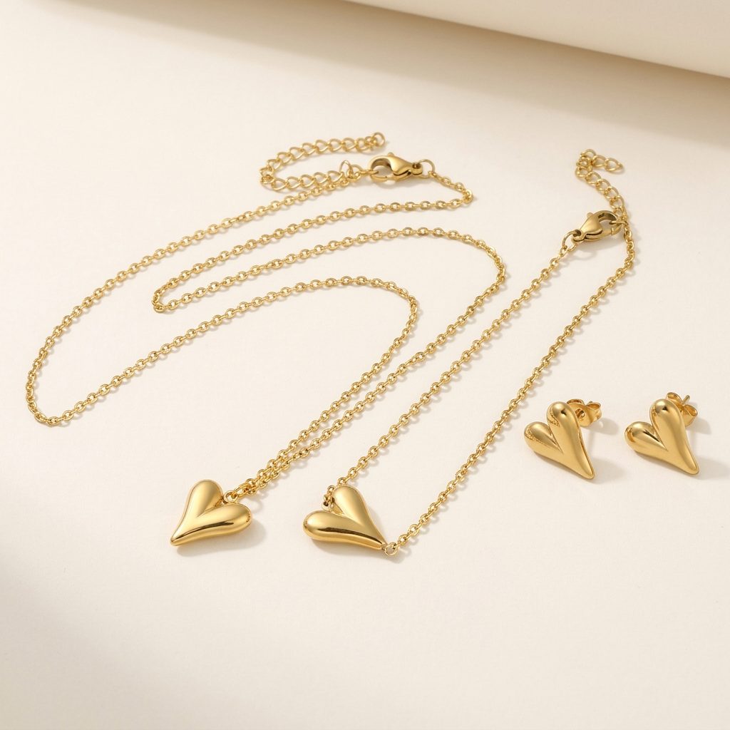 Close-up of gold heart pendant jewellery set